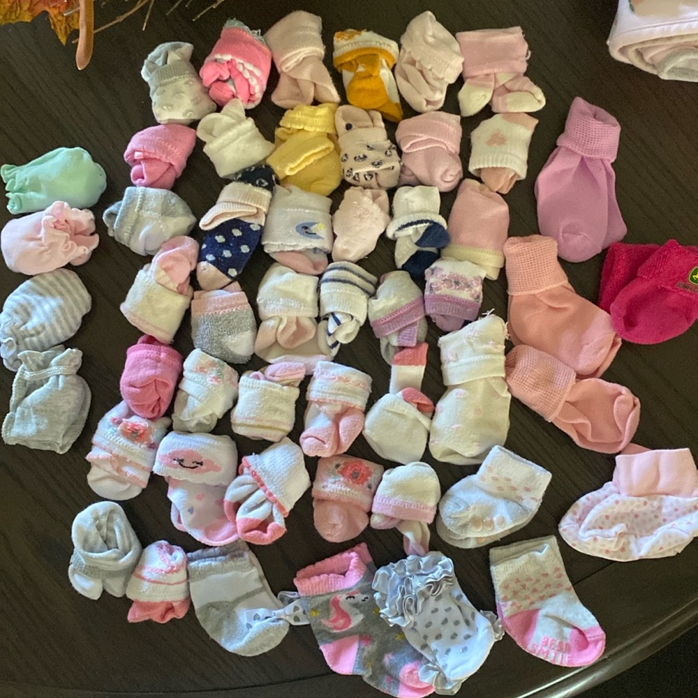 Bundle of baby socks and mittens